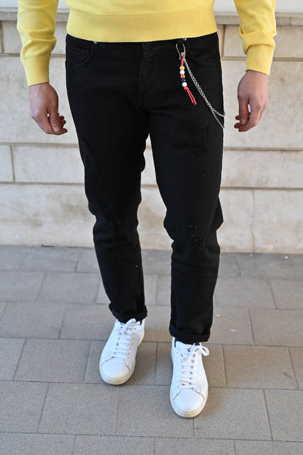 Jeans nero con strappi